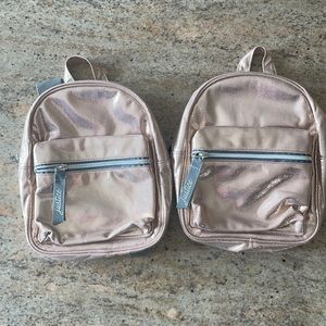 2 Brand New Rosegold mini backpacks